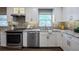 Updated kitchen features a stainless steel oven and dishwasher, and bright white cabinets at 4006 Glen Garry W Rd, Lakeland, FL 33813