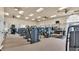 Bright fitness center featuring modern exercise equipment and a mirrored wall for full visibility at 4088 Prima Lago Cir, Lakeland, FL 33810