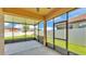 Screened-in lanai offering ample outdoor space and backyard views at 4088 Prima Lago Cir, Lakeland, FL 33810
