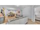 Open-concept living space with dining area and kitchen; perfect for entertaining at 4088 Prima Lago Cir, Lakeland, FL 33810
