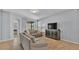 Comfortable living area with neutral tones and access to outdoor space at 4088 Prima Lago Cir, Lakeland, FL 33810