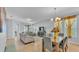 Inviting living room and dining area with tile floors and stylish furniture at 4088 Prima Lago Cir, Lakeland, FL 33810
