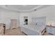 Cozy main bedroom with decorative furniture and ample natural light at 4088 Prima Lago Cir, Lakeland, FL 33810