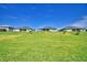 Expansive backyard showcasing lush green grass and well-maintained landscaping at 4300 Juliana Lake Dr, Auburndale, FL 33823