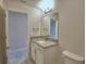 Well-lit bathroom with granite countertop vanity and recessed lighting at 4300 Juliana Lake Dr, Auburndale, FL 33823