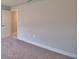Bedroom with carpet floors, white trim and ample space at 4300 Juliana Lake Dr, Auburndale, FL 33823