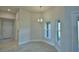 Bright dining area with modern lighting, tile floor and outside view at 4300 Juliana Lake Dr, Auburndale, FL 33823