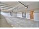 Expansive garage offering parking for two vehicles, a water heater, and access to the house at 4300 Juliana Lake Dr, Auburndale, FL 33823