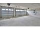 Spacious two-car garage with automatic door openers and ample room for parking at 4300 Juliana Lake Dr, Auburndale, FL 33823