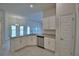 Open kitchen with granite countertops and stainless steel dishwasher at 4300 Juliana Lake Dr, Auburndale, FL 33823