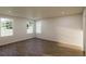 Bright bedroom with hardwood floors and large windows providing natural light at 445 Silverbell Trl, St Cloud, FL 34771