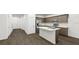 Well-designed kitchen featuring an island, stainless steel appliances, and sleek countertops at 445 Silverbell Trl, St Cloud, FL 34771
