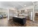 Well-lit kitchen showcases a center island, stainless steel appliances, and ample storage at 4642 Highlands Place Dr, Lakeland, FL 33813