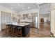 Bright, open-concept kitchen featuring a center island with seating and stainless steel appliances at 4642 Highlands Place Dr, Lakeland, FL 33813