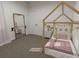 A cute bedroom with a decorative bed frame and playful decor at 470 Windy Willow Way, St Cloud, FL 34771