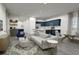View of open living space and kitchen with modern finishes and lots of natural light at 470 Windy Willow Way, St Cloud, FL 34771