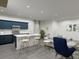 This open-concept space combines a kitchen with bar seating and an inviting living area at 470 Windy Willow Way, St Cloud, FL 34771