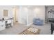 Cozy loft featuring light gray walls, carpet flooring, a desk, and comfortable seating at 485 Silverbell Trl, St Cloud, FL 34771