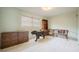 Spacious bedroom with furnishings, a large window, and ample space to create a personalized retreat at 5026 N Socrum Loop Rd, Lakeland, FL 33809