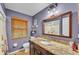 Well lit bathroom featuring a granite vanity top, tile floors and neutral colors at 5108 Waterwood Dr, Bartow, FL 33830