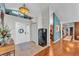 Grand foyer with hardwood floors, high ceilings, and elegant decor at 5108 Waterwood Dr, Bartow, FL 33830