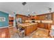 Gourmet kitchen with a large center island, custom cabinetry, and high-end appliances at 5108 Waterwood Dr, Bartow, FL 33830