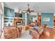 Inviting living room with a cozy fireplace, comfortable seating, and stylish decor at 5108 Waterwood Dr, Bartow, FL 33830