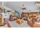 Open floor plan living room with hardwood floors and seamless flow into the kitchen at 5108 Waterwood Dr, Bartow, FL 33830