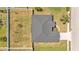 Aerial view of home showing roof and yard with a fenced-in backyard at 5458 Oakford Dr, Lakeland, FL 33812