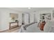 Well-lit bedroom features wood floors, stylish decor, and easy access to other areas of the home at 5458 Oakford Dr, Lakeland, FL 33812