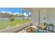 Serene screened patio with comfortable seating, perfect for enjoying the outdoors while staying protected from the elements at 5458 Oakford Dr, Lakeland, FL 33812