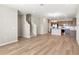 Open concept living space with kitchen, staircase, and lots of natural light at 5771 Freshwater Canyon Dr, St Cloud, FL 34771