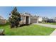 Charming home featuring a manicured lawn, and a two-car garage in a residential neighborhood at 606 Fairview Ave # 244, Haines City, FL 33844