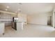 Contemporary kitchen area features stainless steel appliances, granite countertops, and tile flooring at 606 Fairview Ave # 244, Haines City, FL 33844