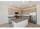 Modern kitchen showcasing stainless steel appliances, granite countertops, and ample cabinet space at 606 Fairview Ave # 244, Haines City, FL 33844