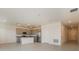 Bright open kitchen featuring stainless steel appliances and a granite countertop island at 606 Fairview Ave # 244, Haines City, FL 33844