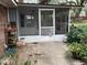 Enclosed screened patio area perfect for outdoor living, conveniently located off the main house at 6116 Sweet Gum Run, Bartow, FL 33830