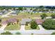 Aerial view of a home featuring a landscaped yard, driveway, and surrounded by neighborhood homes at 6339 Alamanda Hills Dr, Lakeland, FL 33813
