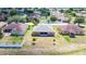 Rear exterior shot of a single Gathering house featuring a small yard with limited landscaping at 6339 Alamanda Hills Dr, Lakeland, FL 33813