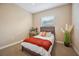 Cozy bedroom with carpet, window, and decor, offering a relaxing space at 6339 Alamanda Hills Dr, Lakeland, FL 33813