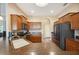 A kitchen showcasing wood cabinets, modern appliances, and a breakfast bar at 6339 Alamanda Hills Dr, Lakeland, FL 33813