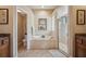Primary bathroom boasts a soaking tub and separate glass-enclosed shower at 6339 Alamanda Hills Dr, Lakeland, FL 33813