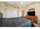 Spacious main bedroom with a large closet, dresser and neutral color scheme at 6339 Alamanda Hills Dr, Lakeland, FL 33813