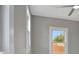 Bedroom featuring a window allowing for natural light, and a modern ceiling fan at 727 S Missouri Ave, Lakeland, FL 33815