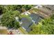 Aerial view of the property showcasing the newly installed roof and landscaping at 731 S Missouri Ave, Lakeland, FL 33815