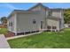 Well-maintained backyard with green lawn and exterior view of home at 731 S Missouri Ave, Lakeland, FL 33815