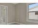The bathroom is accessible from the bedroom and has a walk-in shower, a vanity, and a toilet at 731 S Missouri Ave, Lakeland, FL 33815