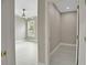 This bedroom boasts a large window, a ceiling fan, light wood flooring, and a closet at 731 S Missouri Ave, Lakeland, FL 33815