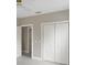 Light-filled bedroom with closet, ensuite bathroom, recessed lighting, and neutral decor at 731 S Missouri Ave, Lakeland, FL 33815