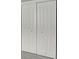Close-up of white bi-fold closet doors at 731 S Missouri Ave, Lakeland, FL 33815